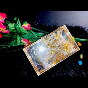 Nothing 2 Hide Clear clutch purse with gold chain strap